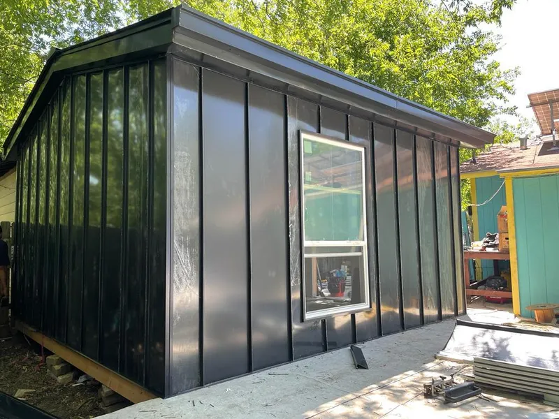 Black standing seam metal wall panels for Roof Inspection in Chili