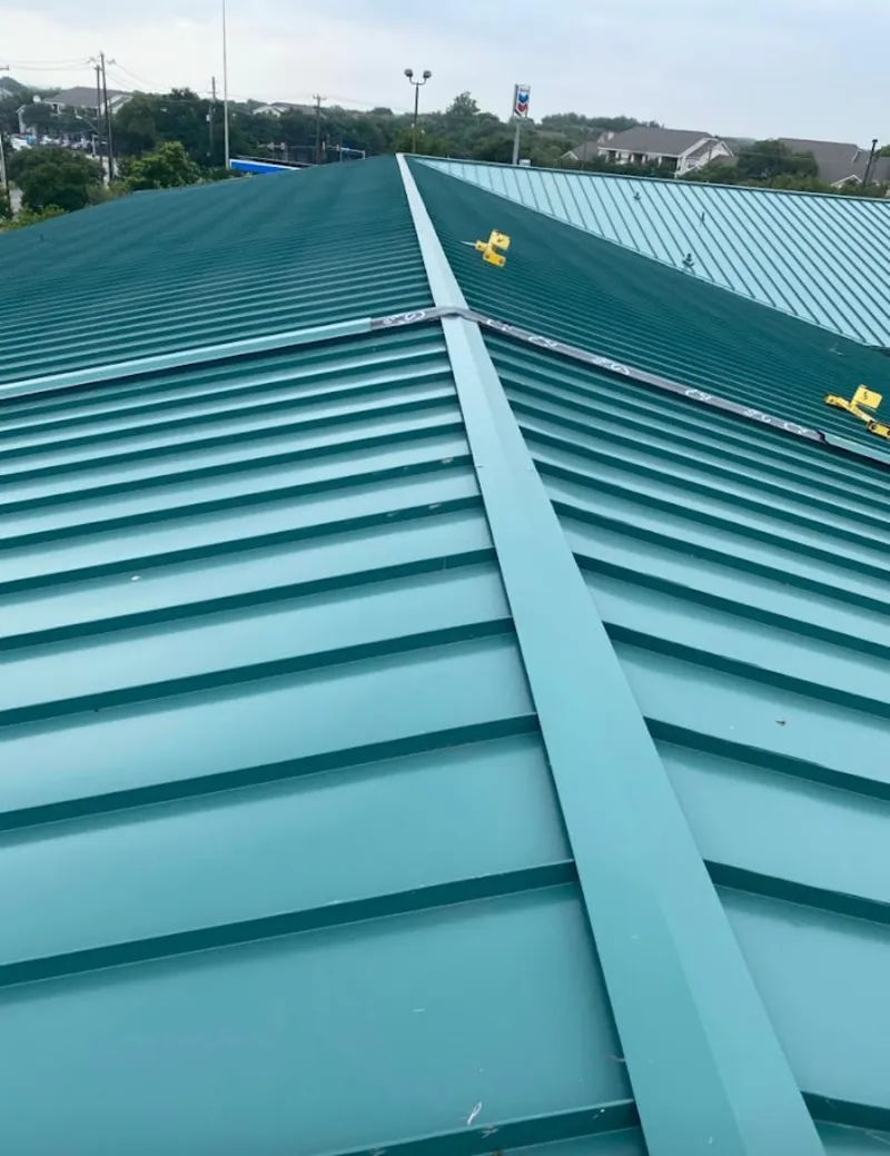 Green commercial metal roof ridge and valley for Metal Roof Repair in Chili